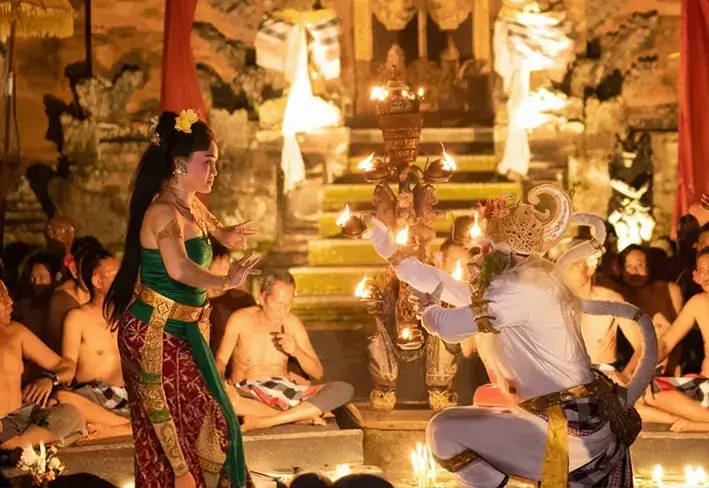 Traditional Balinese Kecak fire dance performance at night, an authentic cultural highlight of our bali tour package.