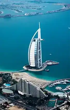 Iconic Burj Al Arab in Dubai, a luxury hotel famous for its unique sail-like architecture and lavish amenities.