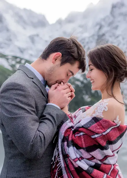 A romantic couple in the snowy mountains destination.