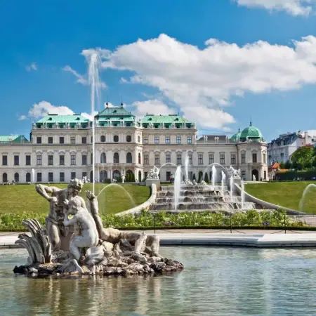 A majestic view of the emperor's palace in Vienna, featuring ornate details and expansive grounds.