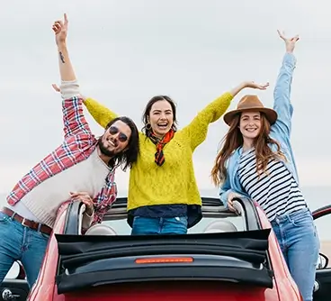 Happy friends enjoying Singapore trip packages and group travel experience