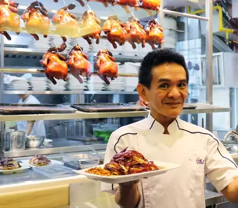 Authentic Singapore food experience with roast duck and chef
