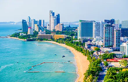 Split image: busy Bangkok street and sunny Pattaya beach; 7-days adventure.