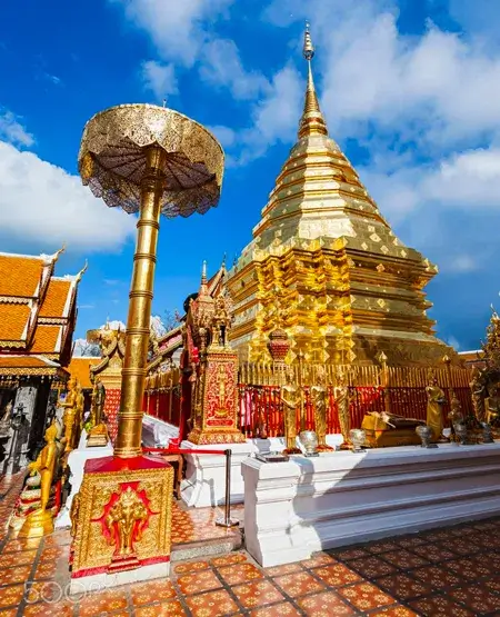 The majestic golden Chedi (spire) of Wat Phra That Doi Suthep temple, high above Chiang Mai.