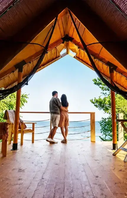 Couple enjoying a romantic beach resort stay in Thailand honeymoon tour packages with scenic ocean views and luxury accommodation.