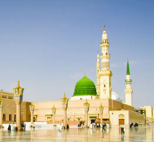 Masjid al-Nabawi in Madinah at sunset, a key destination in the Umrah with Dubai Tour Package.